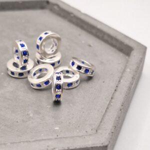 BERLOQUE SEPARADOR EM PRATA COM PEDRA DE ZIRCÔNIA AZUL