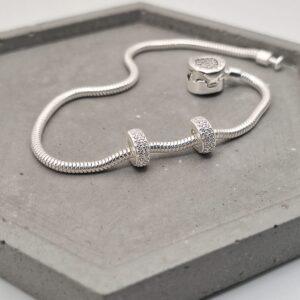 BERLOQUE SEPARADOR MICRO COM PEDRA DE ZIRCÔNIA BRANCA